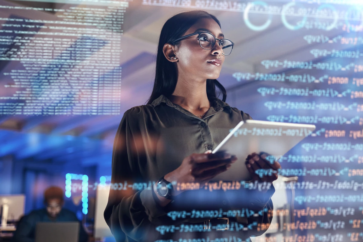 Programmer or IT person in glasses on 3d screen, programming and cybersecurity research
